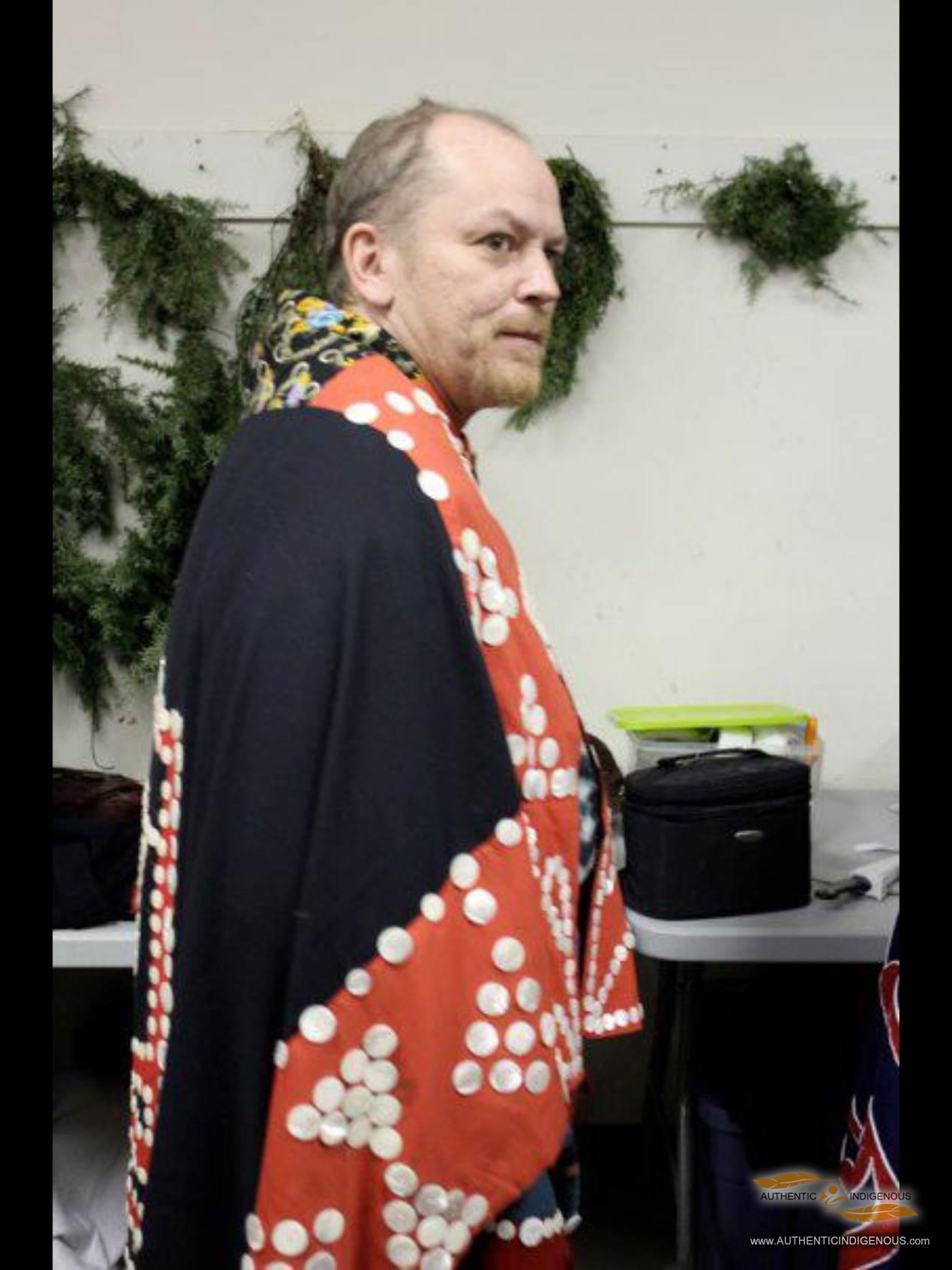 Shawn Karpes (Kwak'waka'wakw) wearing his button blanket